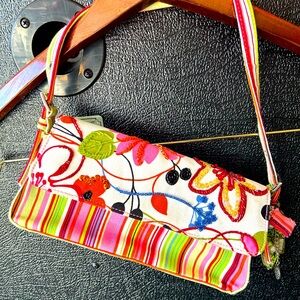 Vibrant mini purse with sequin and beaded accents on the flap.